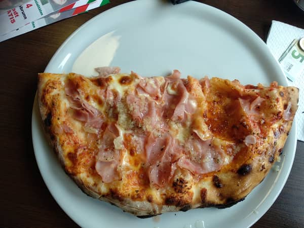 Knusprige Pizza-Genüsse in gemütlicher Atmosphäre erleben
